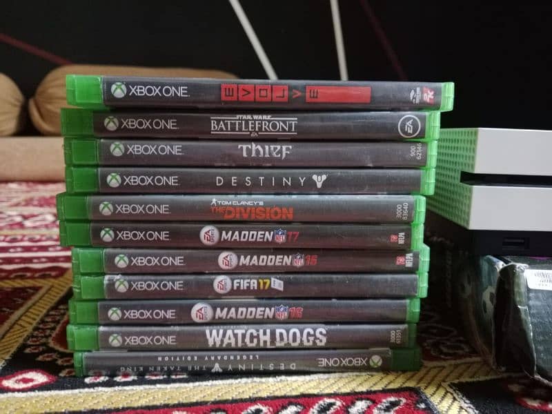 Xbox One S Along with 2 Controllers and Games. 5