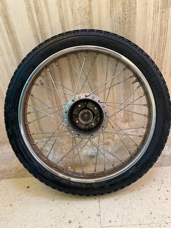 70 cc bike back rim with complete tire 1