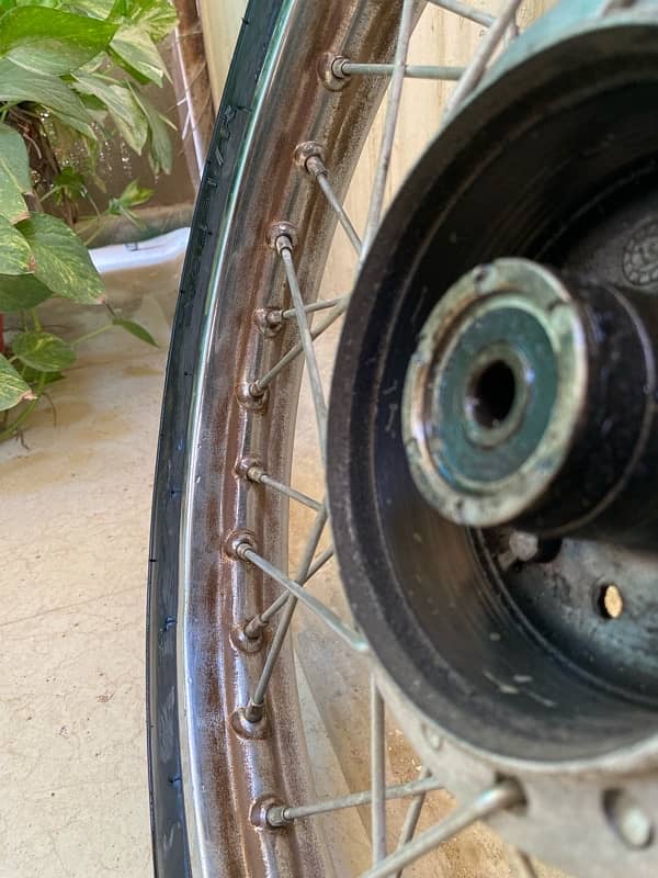 70 cc bike back rim with complete tire 6