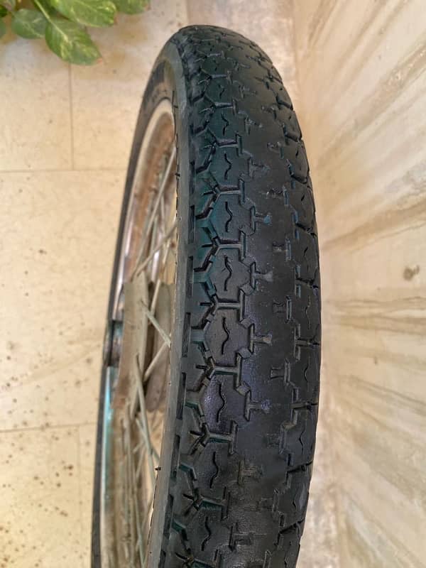 70 cc bike back rim with complete tire 10