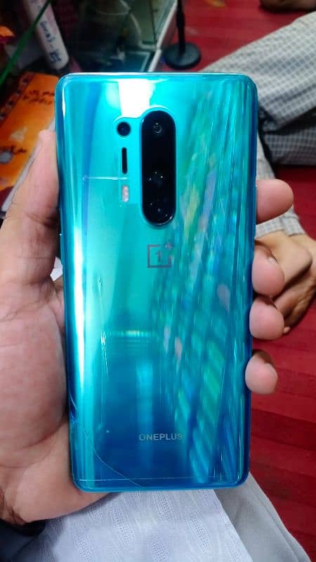 Oneplus 8 pro 10/9.5 8GB 128GB waterpacked No opend Back crack Minor 4