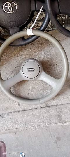 Suzuki mahran and Suzuki pekkap staring wheel