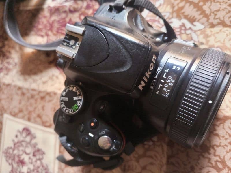 Nikon D5100 (with 50mm youngo lense) 2