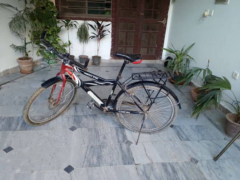 boys bicycle in a good condition with removable backseat 1