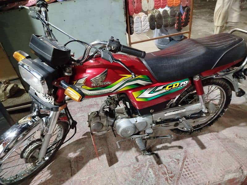 I am offering to sell you CD 70 Bike in Red colour(Honda Company) 0