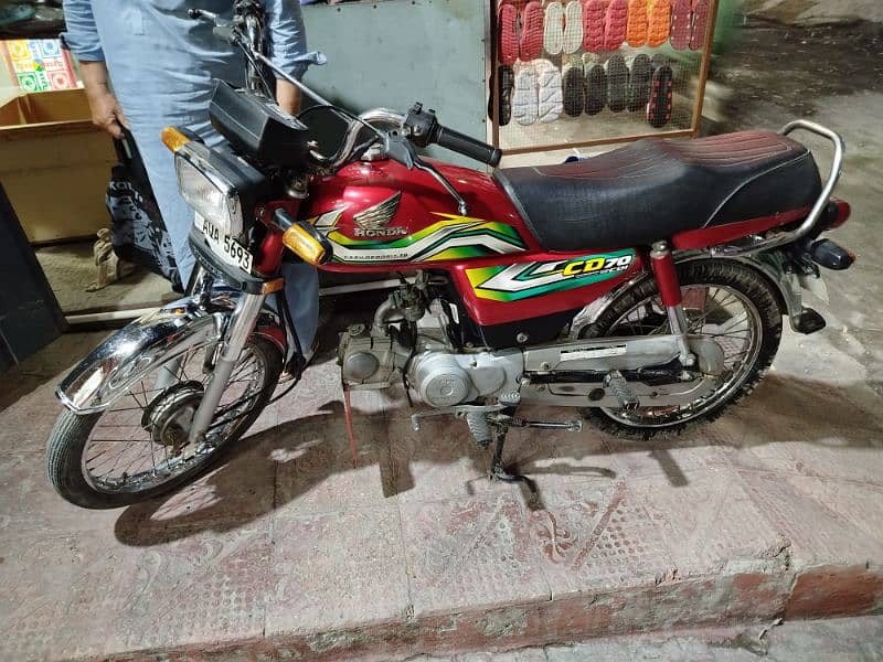 I am offering to sell you CD 70 Bike in Red colour(Honda Company) 3