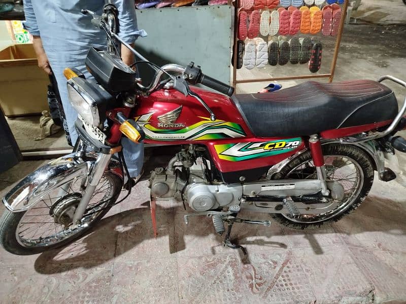 I am offering to sell you CD 70 Bike in Red colour(Honda Company) 4