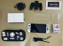 NINTENDO SWITCH OLED WITH BOX AND EXTRA ACCESSORIES