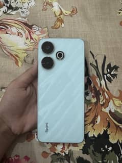 Redmi 13 (Xiaomi) shiny blue. 1 month old. 0