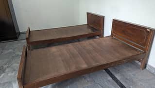 Used Wooden Beds with used mattress are for urgent Sale in Taxila