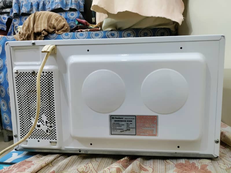 Microwave oven dawlance unused 10/10 3