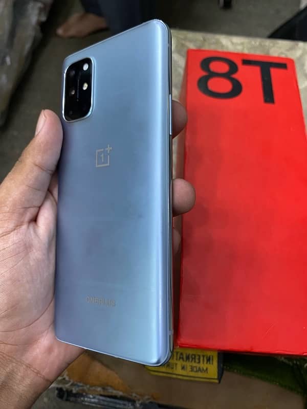 One plus 8t 10/10 condition with box new phone 1