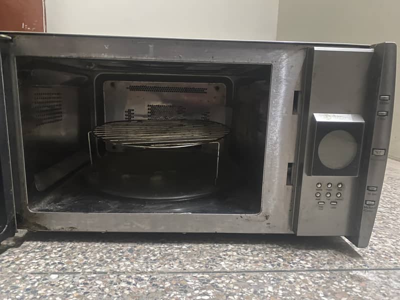 Dawlance Black Microwave Oven in Excellent Condition - Quick Sale! 1