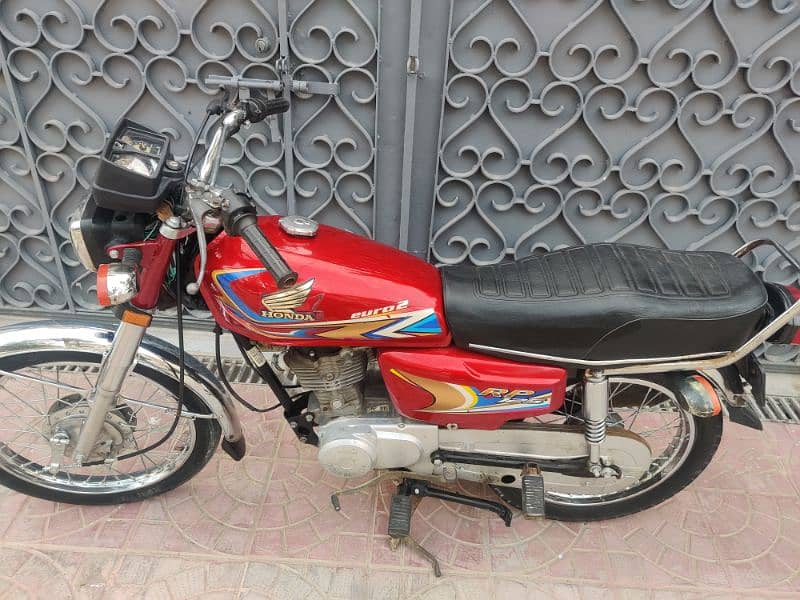 road price 125 model 2021 Karachi number all ok 1