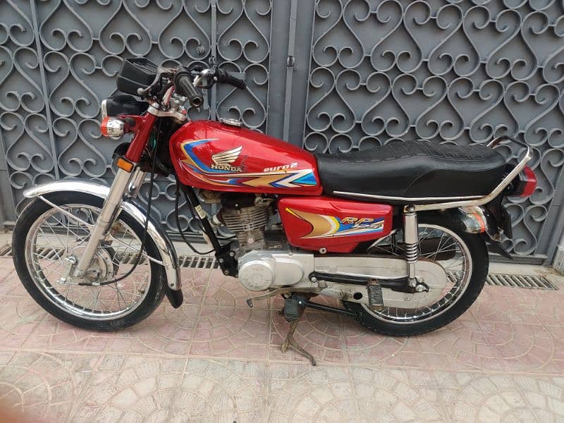 road price 125 model 2021 Karachi number all ok 4