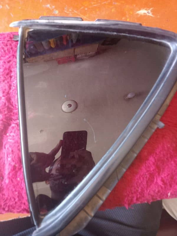 Left side toyota Aqua hybrid mirror price 20000 1