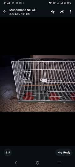 Parrot cage with breeding box