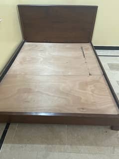 wooden double bed