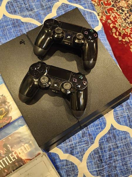 Playstation 4 slim 1TB with 2 controllers 2