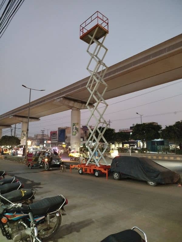 scissor lift 40 feet hight bettery operated 2 new betterys installed 1