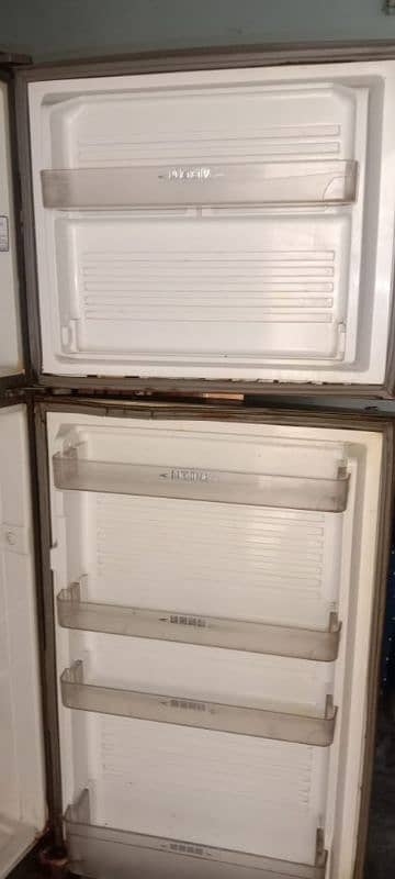 neat and clean refrigerator urgent sell original gas 1