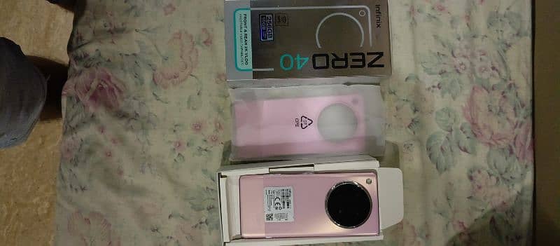 Infinix Zero 40 ( Just Box Open ) Blossom Glow 1