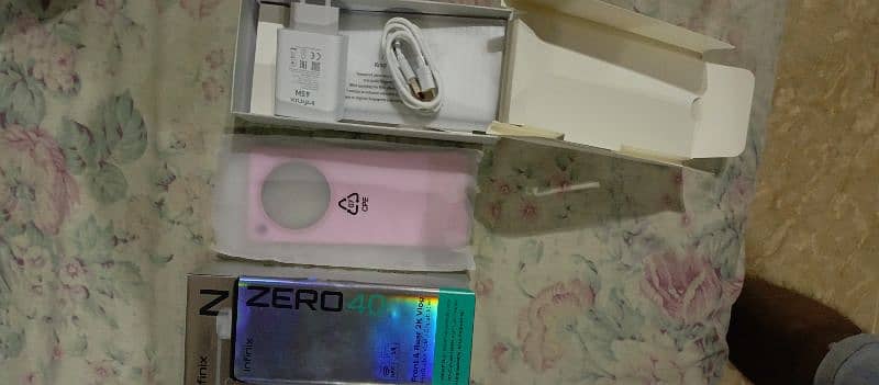 Infinix Zero 40 ( Just Box Open ) Blossom Glow 2