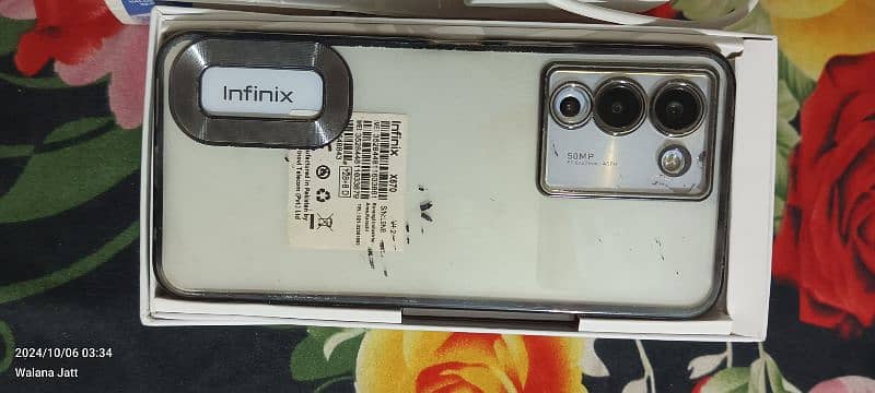 Infinix note 12 g96 (penal change hai or back sy color utra hai Thora. 1