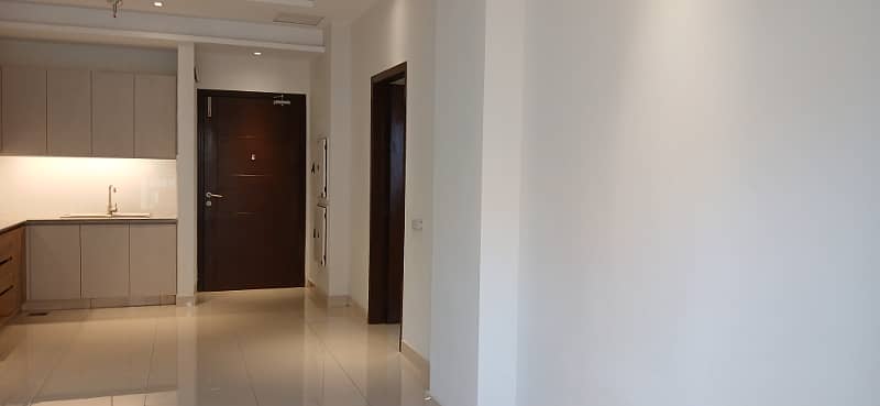 Facing Courtyard 2 Bed Residential Luxury Un Furnished Apartment Available For Rent Near DHA Phase 4 6