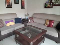 6 sitr sofa set used but 10 by 9 with 3 wooden tables