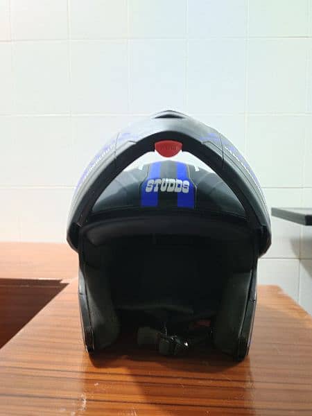 Studds Ninja Elite, matte black with blue strips and black visor. 4