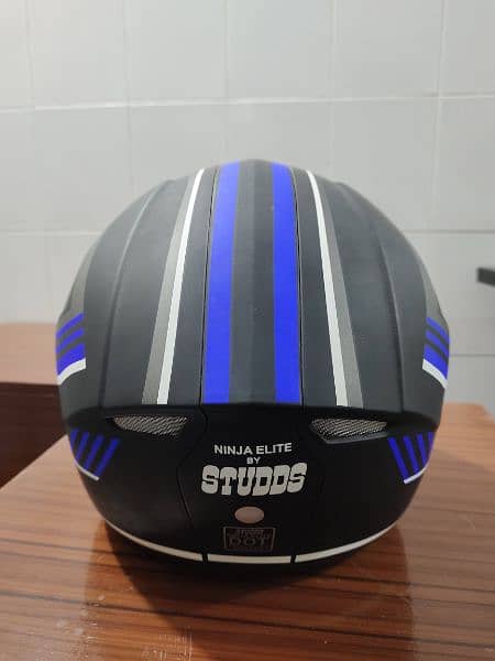 Studds Ninja Elite, matte black with blue strips and black visor. 5