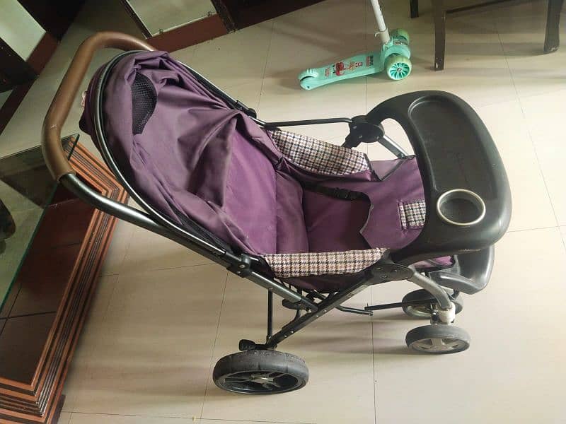 purple colored pram 2