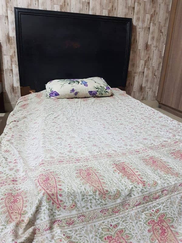 Single wooden bed low lying 3