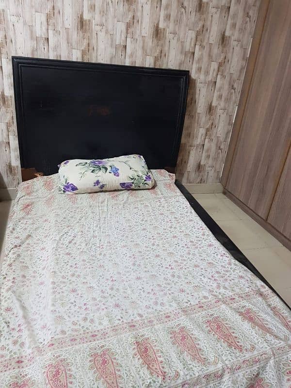 Single wooden bed low lying 4