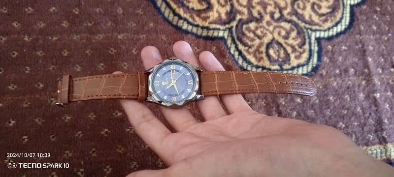 Binbond watch. . 2 straps chain also 0