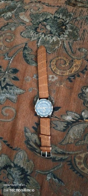 Binbond watch. . 2 straps chain also 1