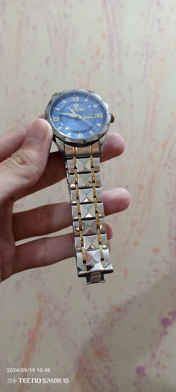 Binbond watch. . 2 straps chain also 7