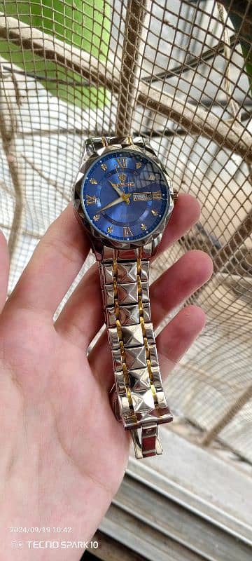 Binbond watch. . 2 straps chain also 12