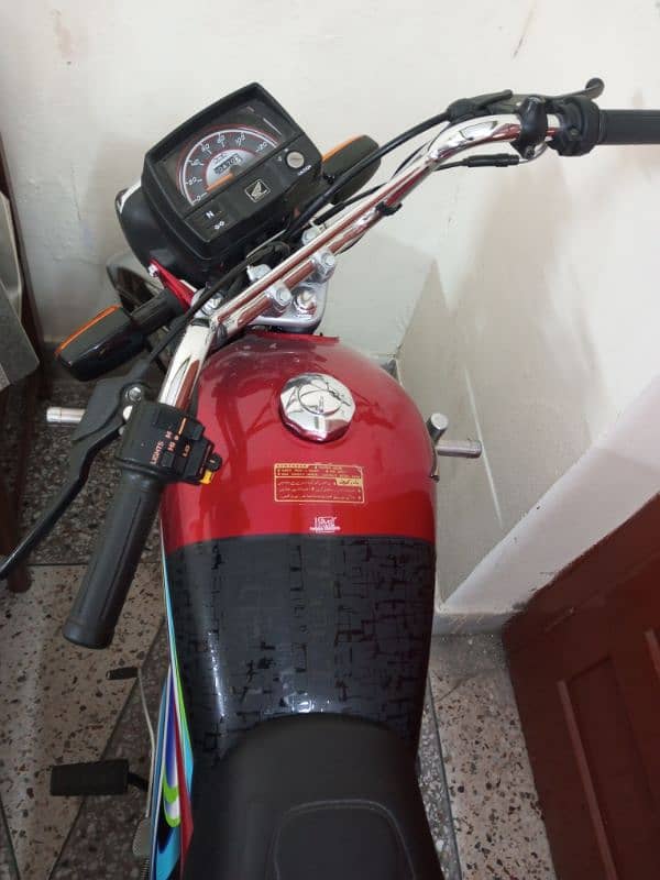 Honda CD 70 2024 3