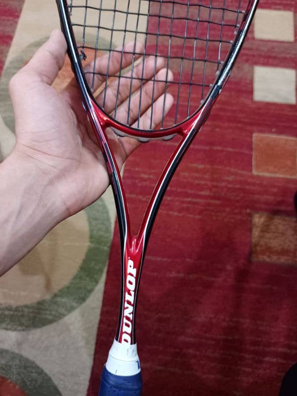 Dunlop squash racquet. 4