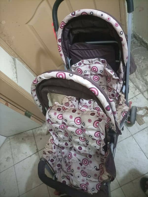 twin pram . double seat front back for 2 kids available 1