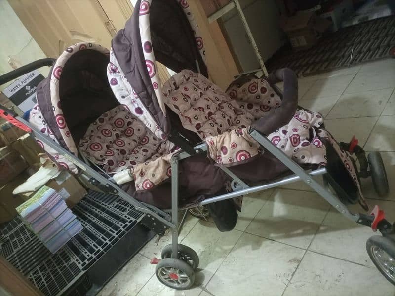 twin pram . double seat front back for 2 kids available 6