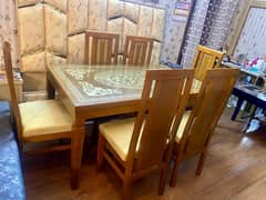 6,chairs and 8,dining set beautiful carving work condition excellent