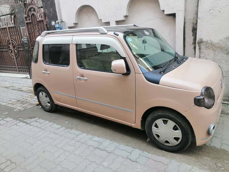 Daihatsu Mira Cocoa 2011 2