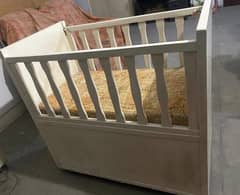 Wooden baby cot