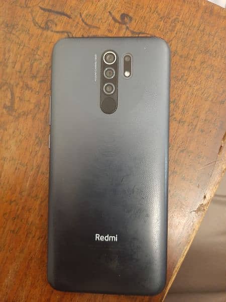 Redmi 9 with box and charger 1