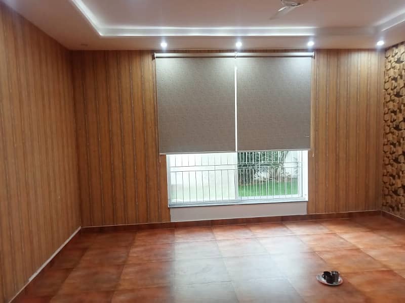 Fully Renovated 1 Kanal Modern House Available For Rent in DHA Phase 2 11