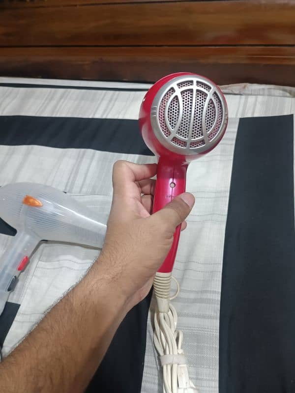 Hair dryers 100%% okay working red available 0