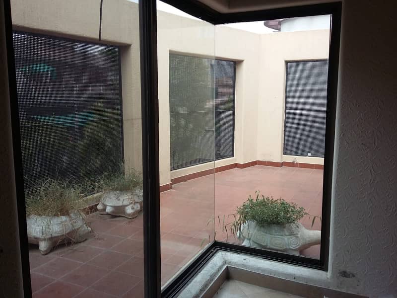 Corner Old Solid Constructed 4 Bedroom house near to Ghazi Road and Commercial 5